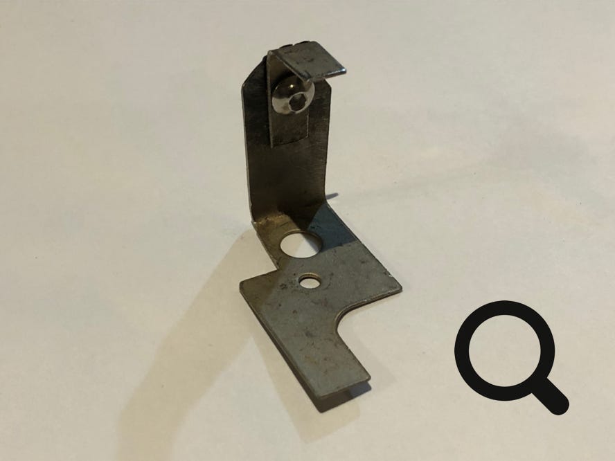 Close-up of Netaheat earth electrode, worn out and then repaired using new tang with nut and bolt